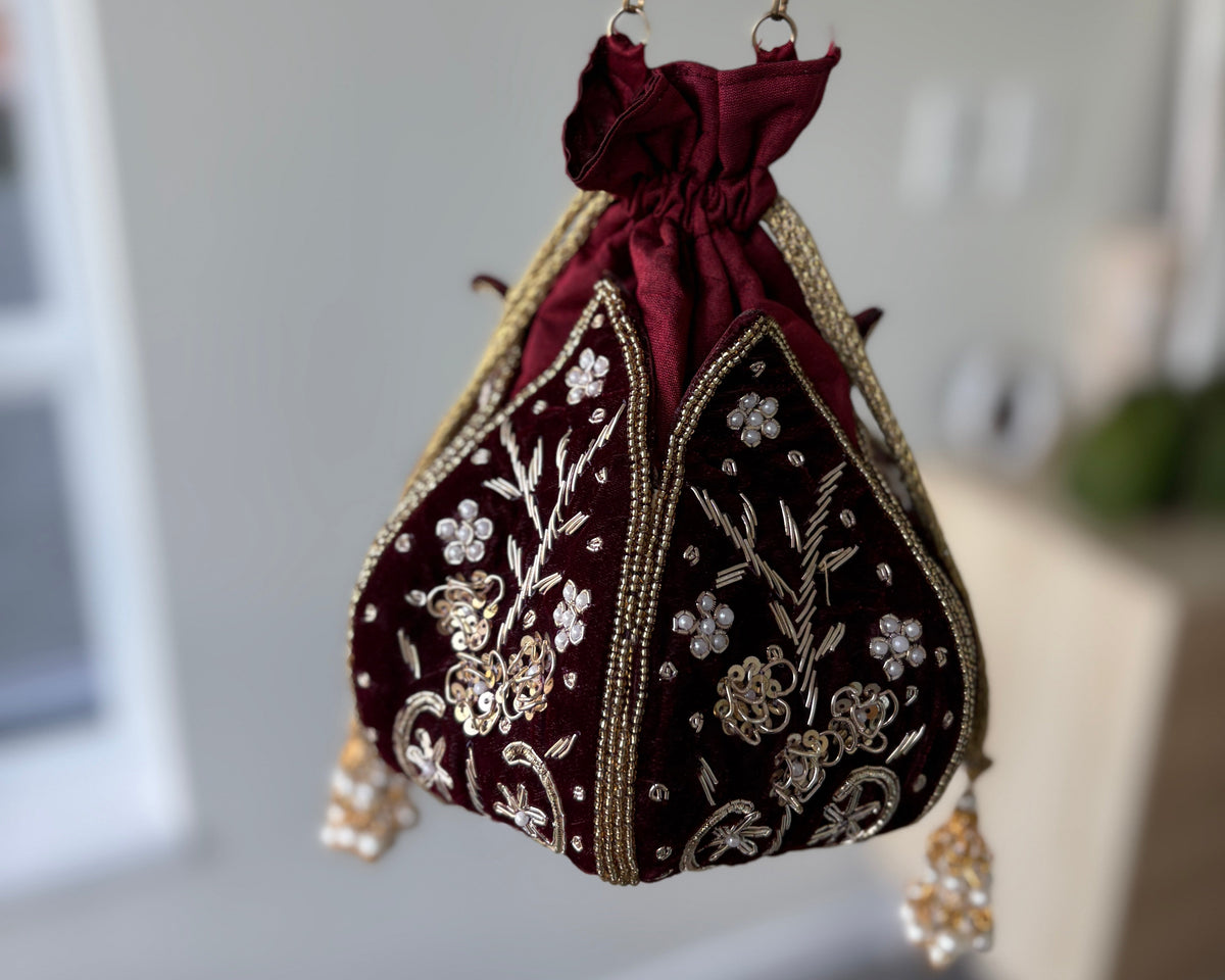 Women Maroon Embroidered Potli Handbag by Rang & Rani